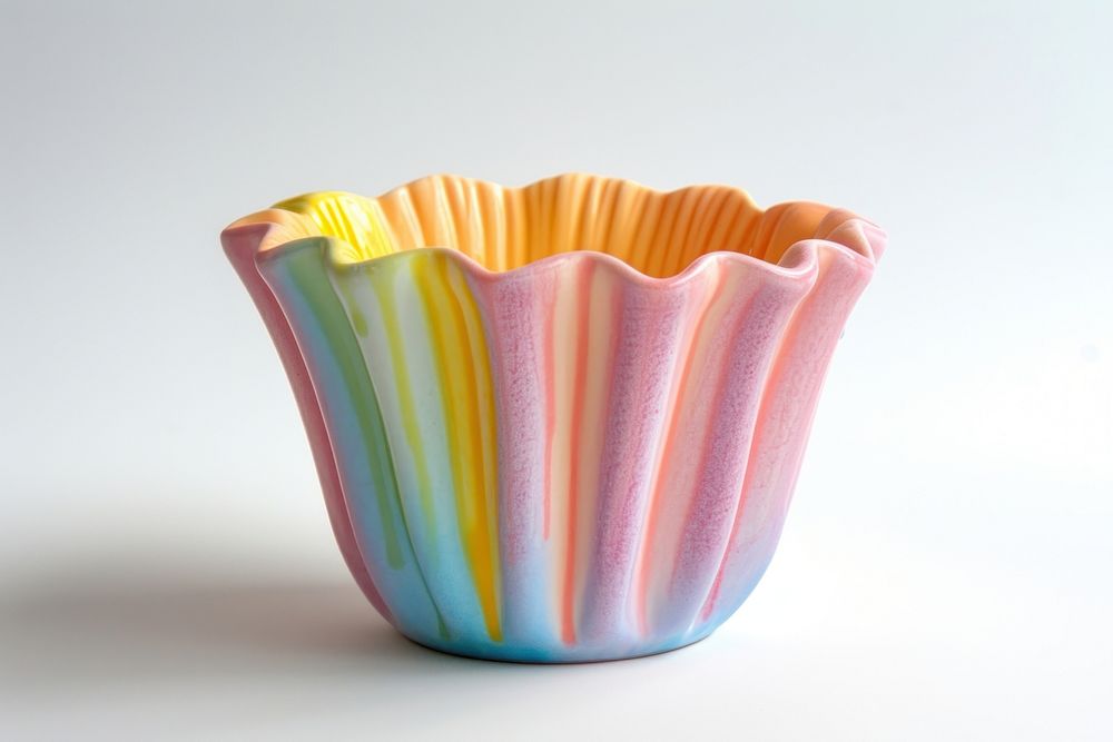 One piece of colorful ceramic cup art made by kid vase simplicity creativity.