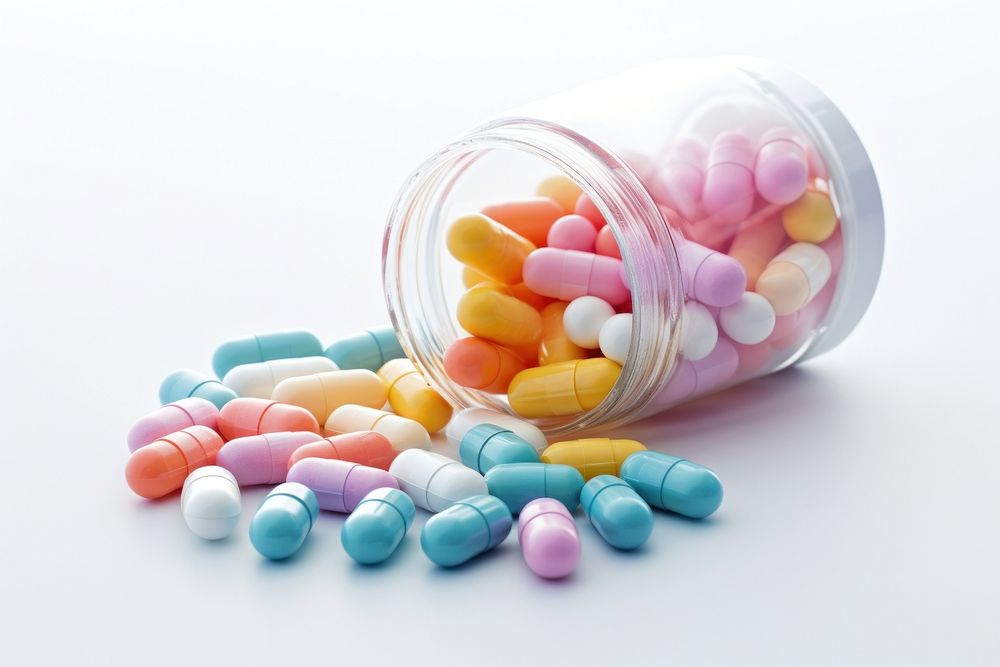 Medicine pill capsule white background confectionery.