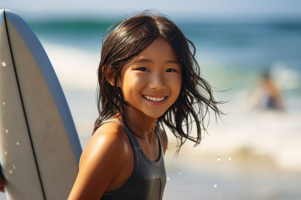 Japanese girl surfer surfing swimwear outdoors smiling.