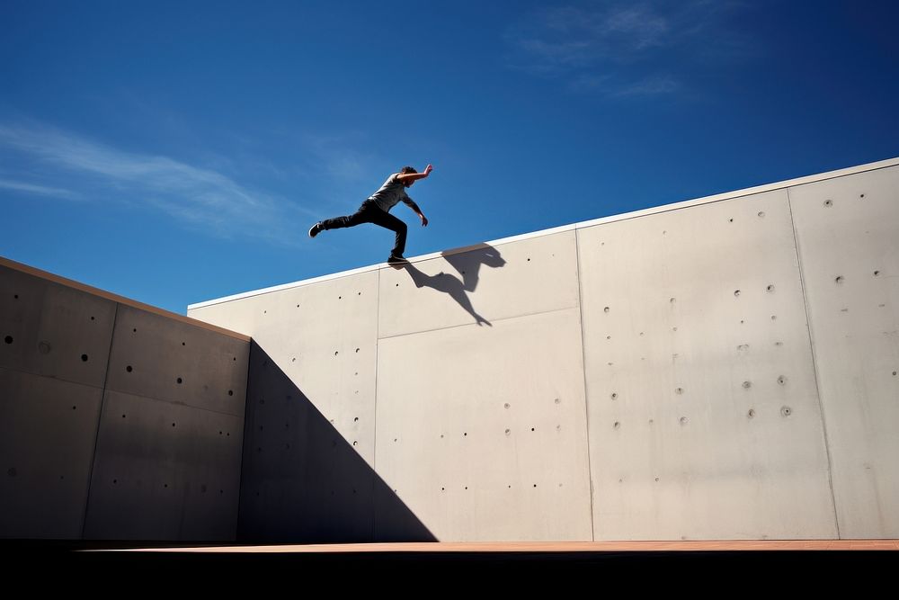 Freerunning outdoors wall architecture.