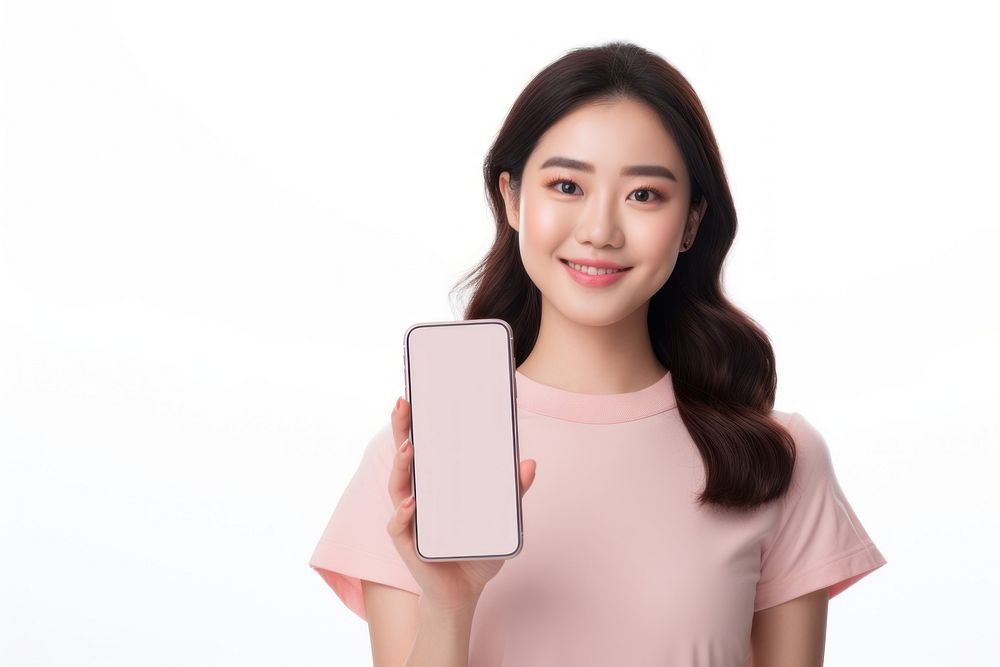 Asian woman holding smartphone portrait smiling screen.