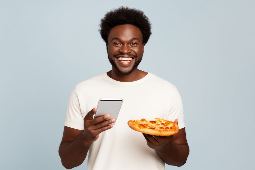 American man in white t-shirt pizza portrait holding.