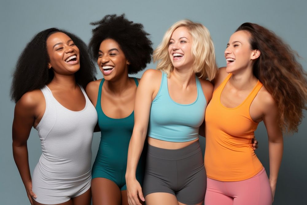 Group of young women laughing friendship adult togetherness.