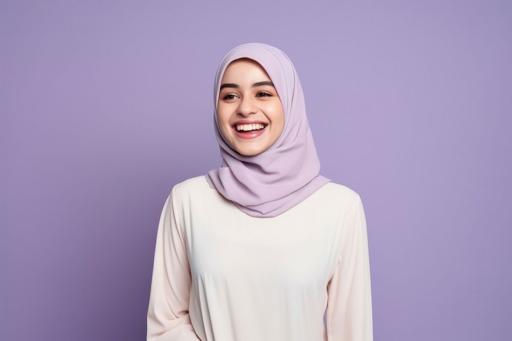 Smiling happy muslim woman portrait hijab scarf.