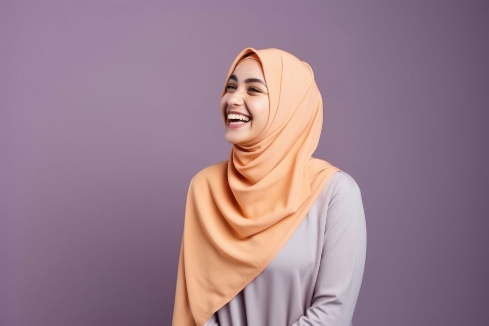 Smiling happy muslim woman portrait laughing hijab.