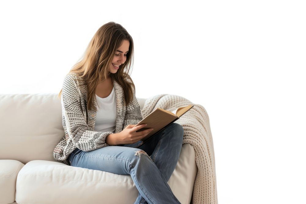 Woman with notebook reading sitting sofa.