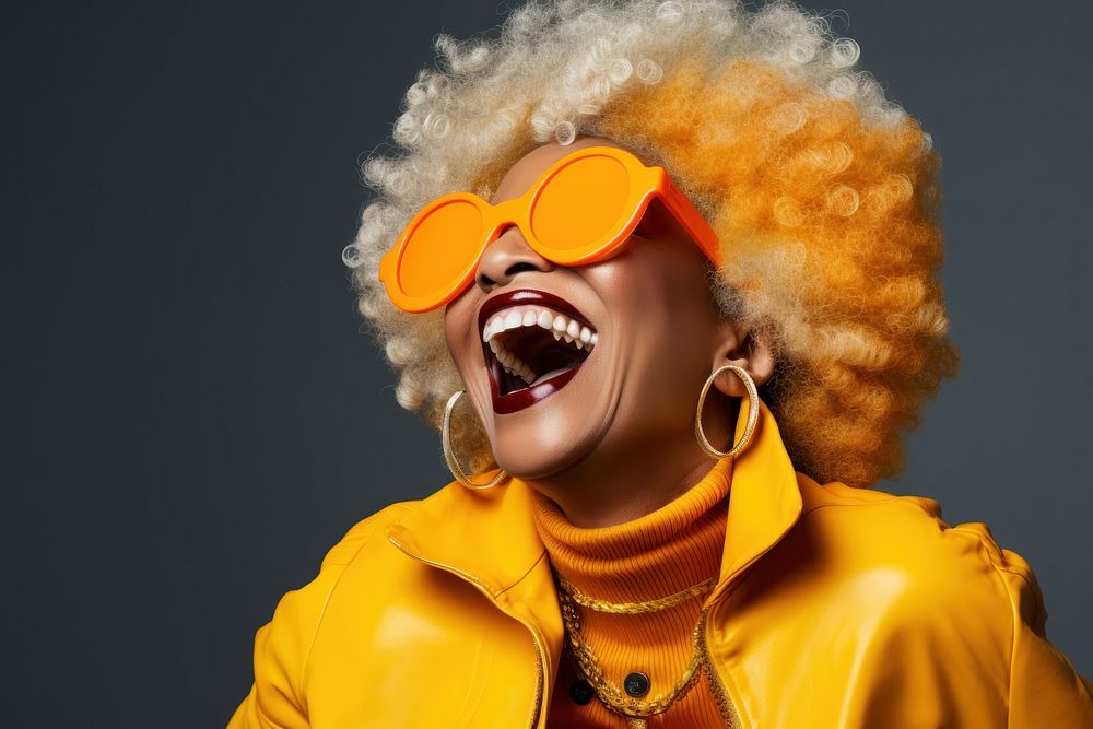 Afroamerican woman sunglasses laughing yellow.