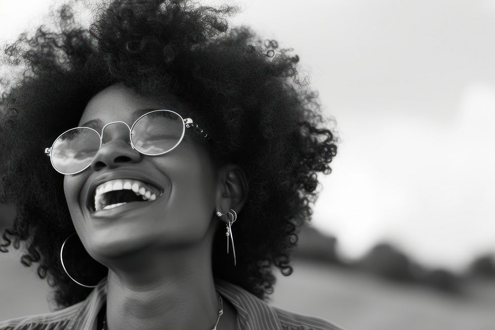 African woman sunglasses portrait cheerful.