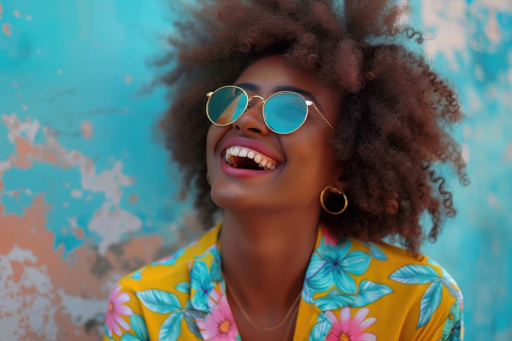 African woman sunglasses cheerful laughing.