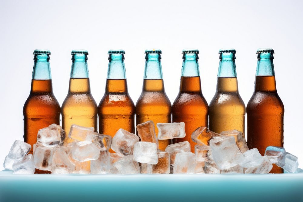 Beer bottles on ice cubes glass drink lager.