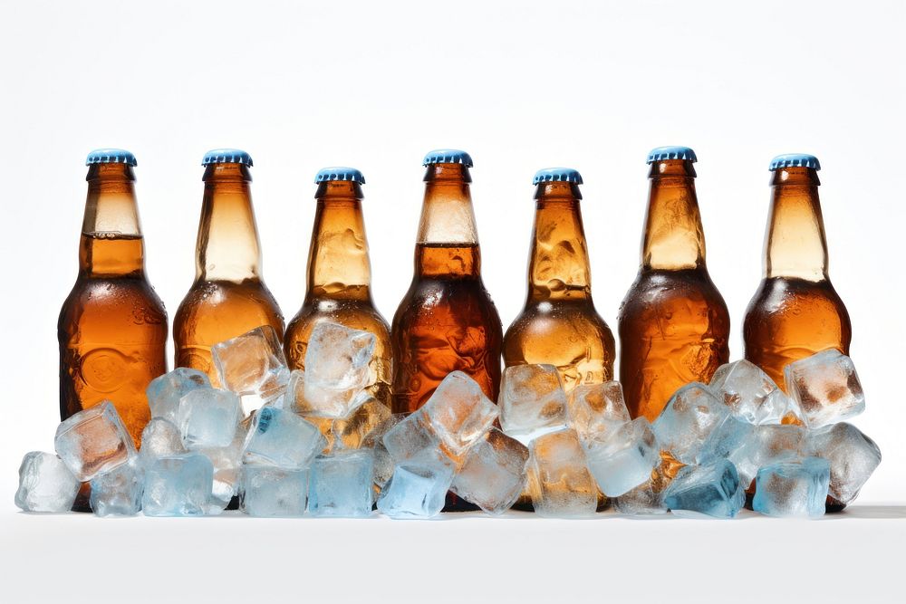 Beer bottles on ice cubes glass drink blue.