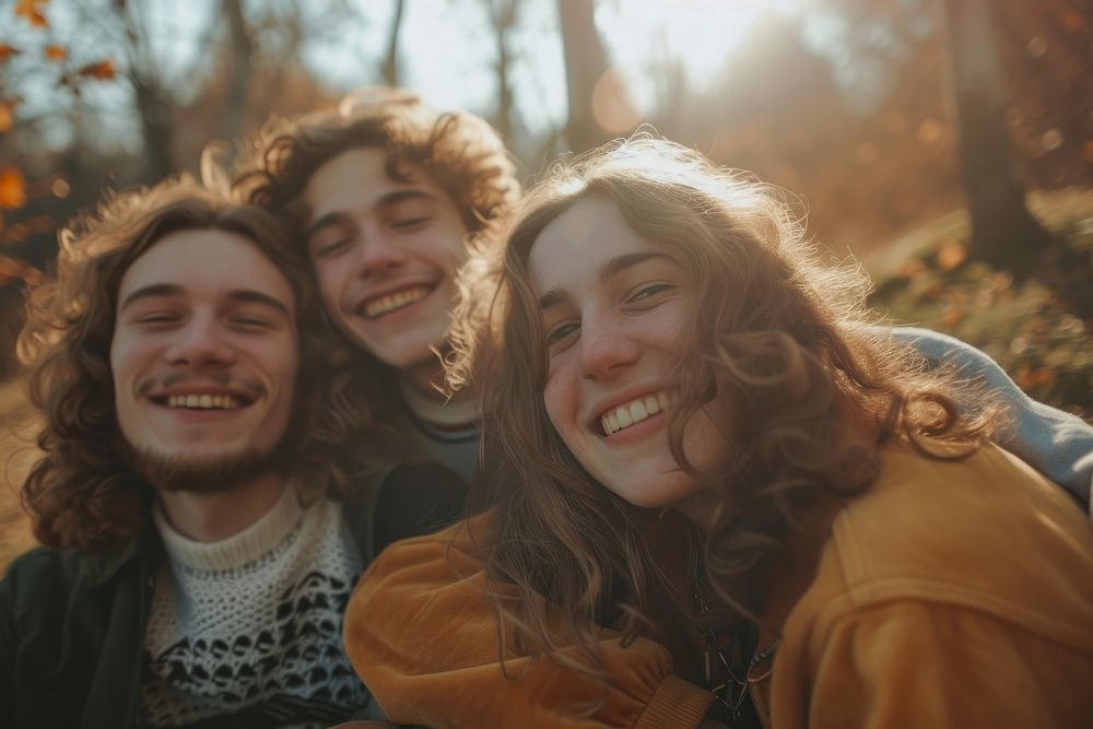 Group of happy young american adult picnic photography laughing portrait.
