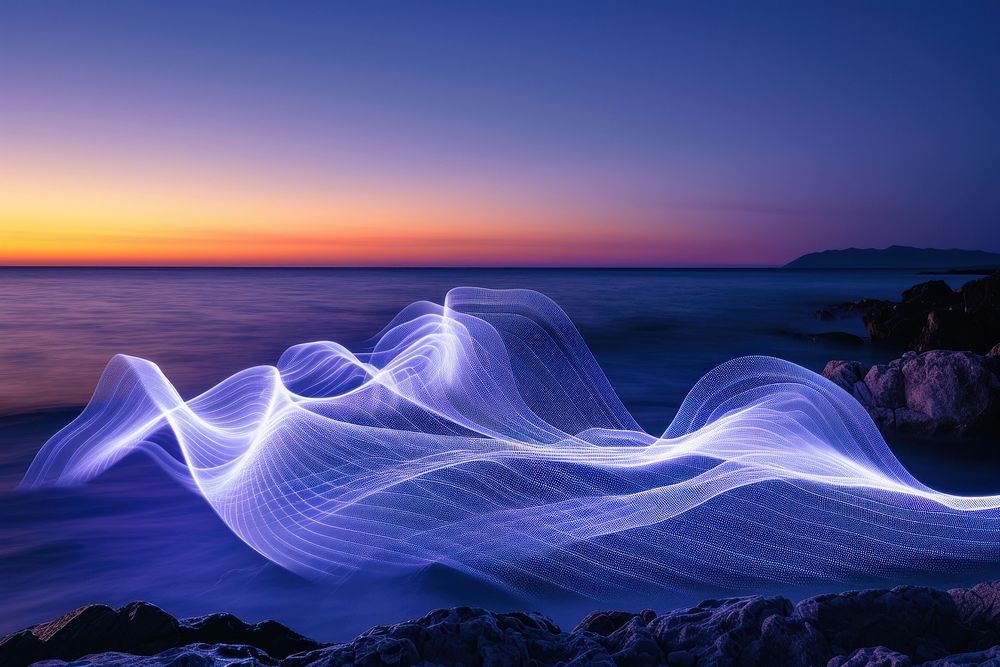 Light painting at the sea during sunset light landscape outdoors.
