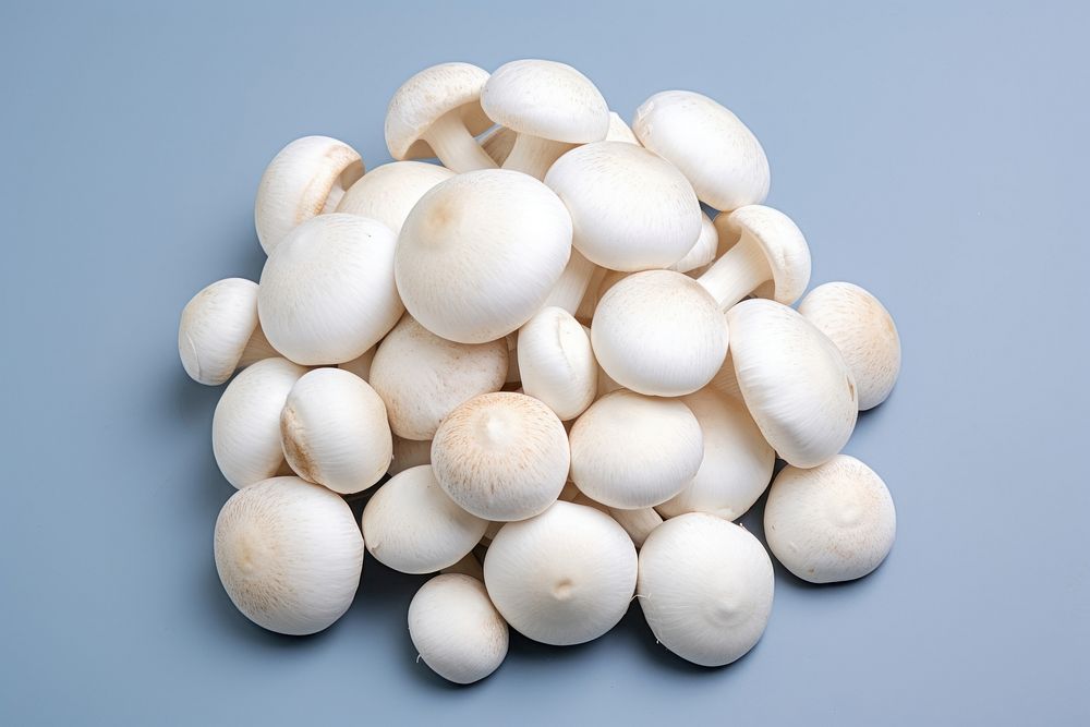 Pile white mushrooms simplicity freshness abundance.