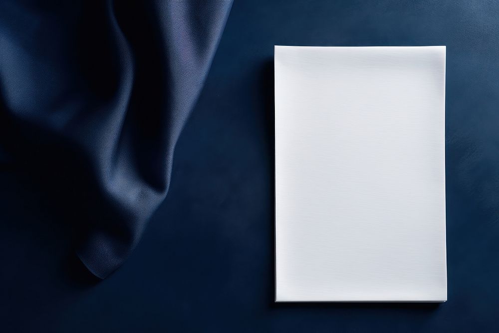 Paper white blank menu card on white plate blue simplicity porcelain.