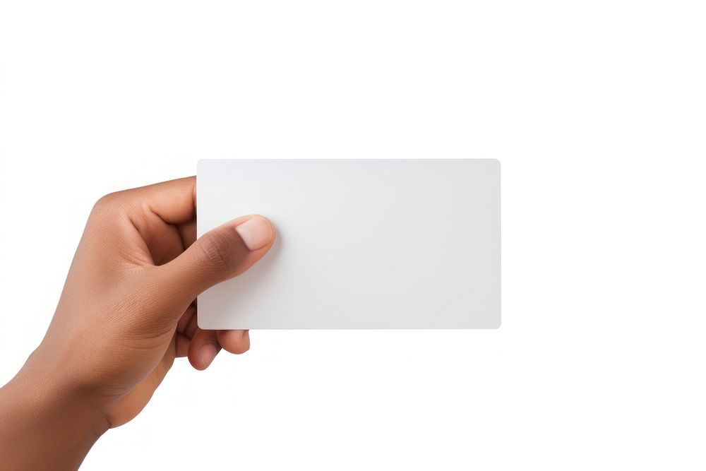 Hand holding a credit card white white background electronics.