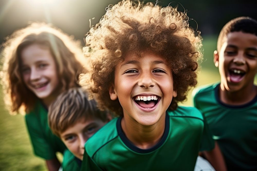 Young soccer players cheerful laughing smile.