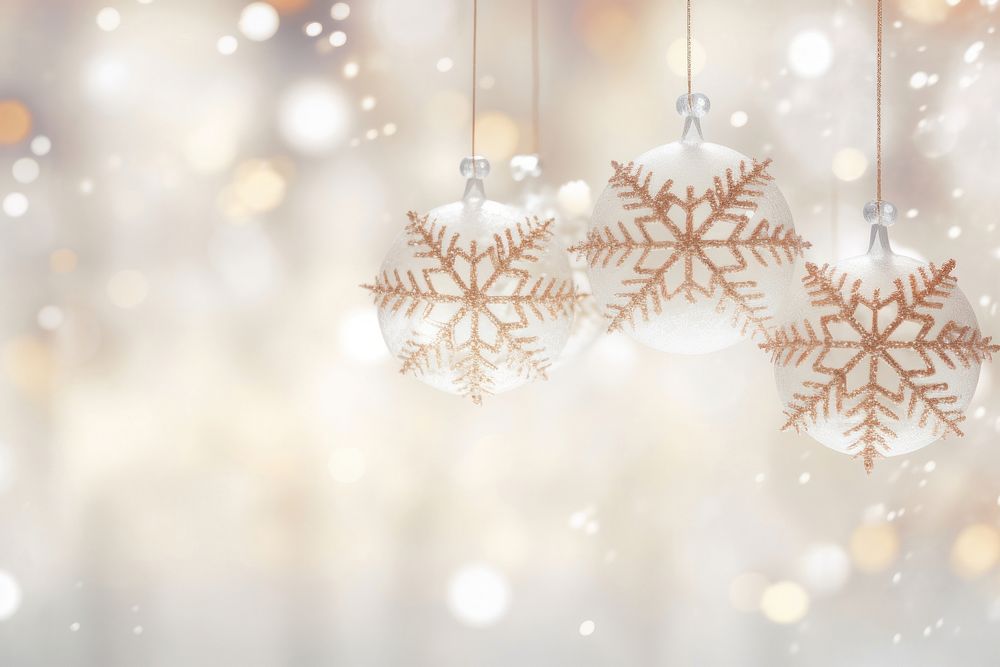 Elegant snowflakes suspended from a luminous bright light white background backgrounds christmas illuminated.