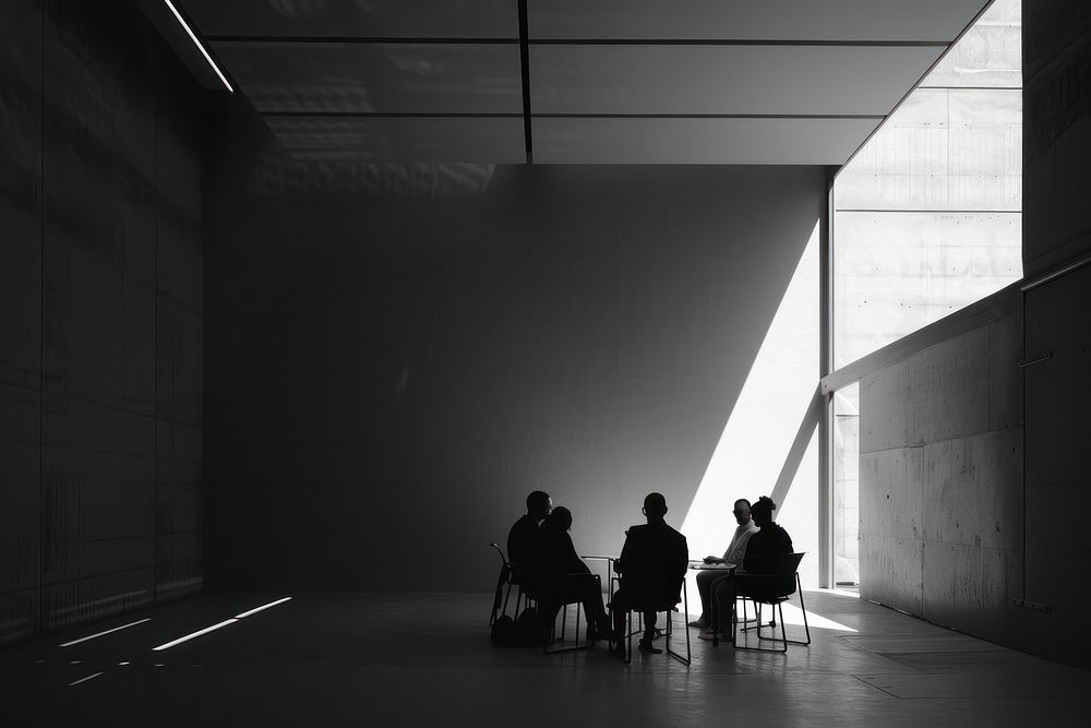 Team in an office architecture silhouette building.