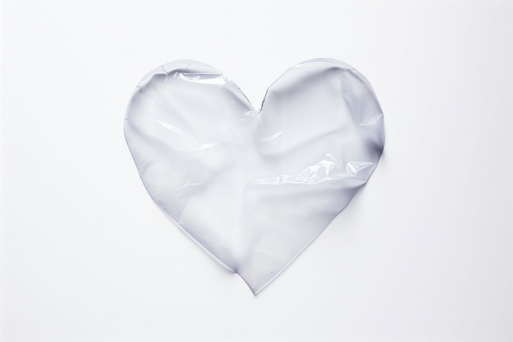 Plastic heart shape white white background crumpled.