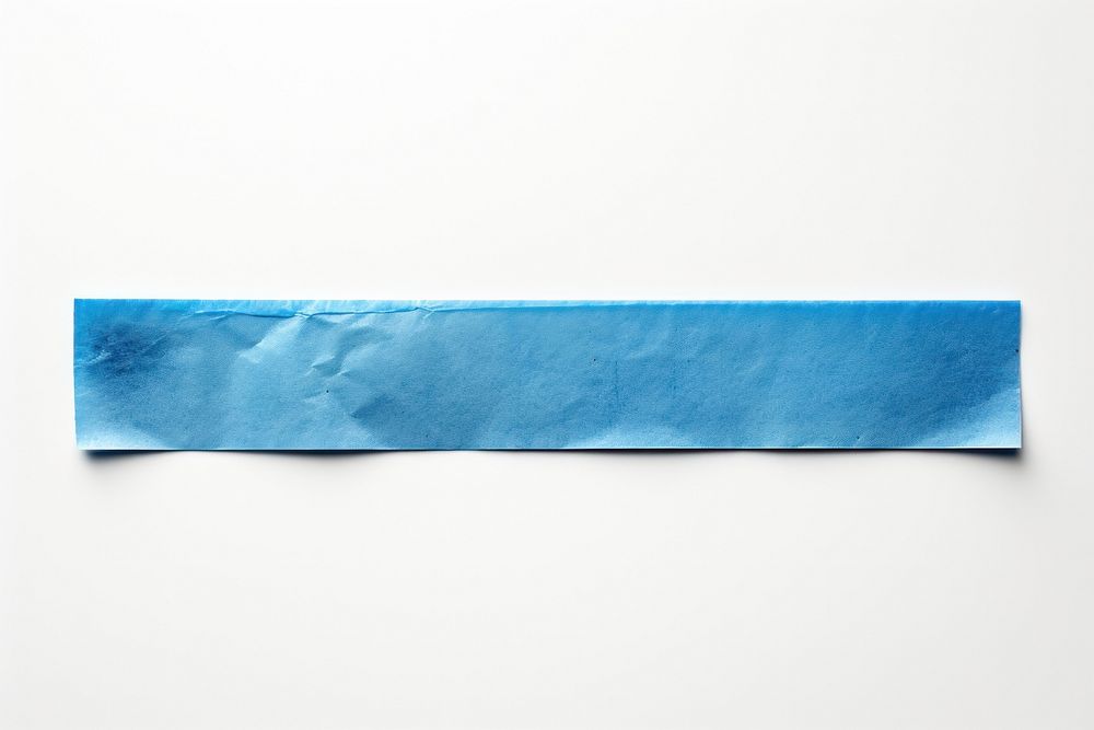Blue foil teature adhesive strip turquoise paper white background.