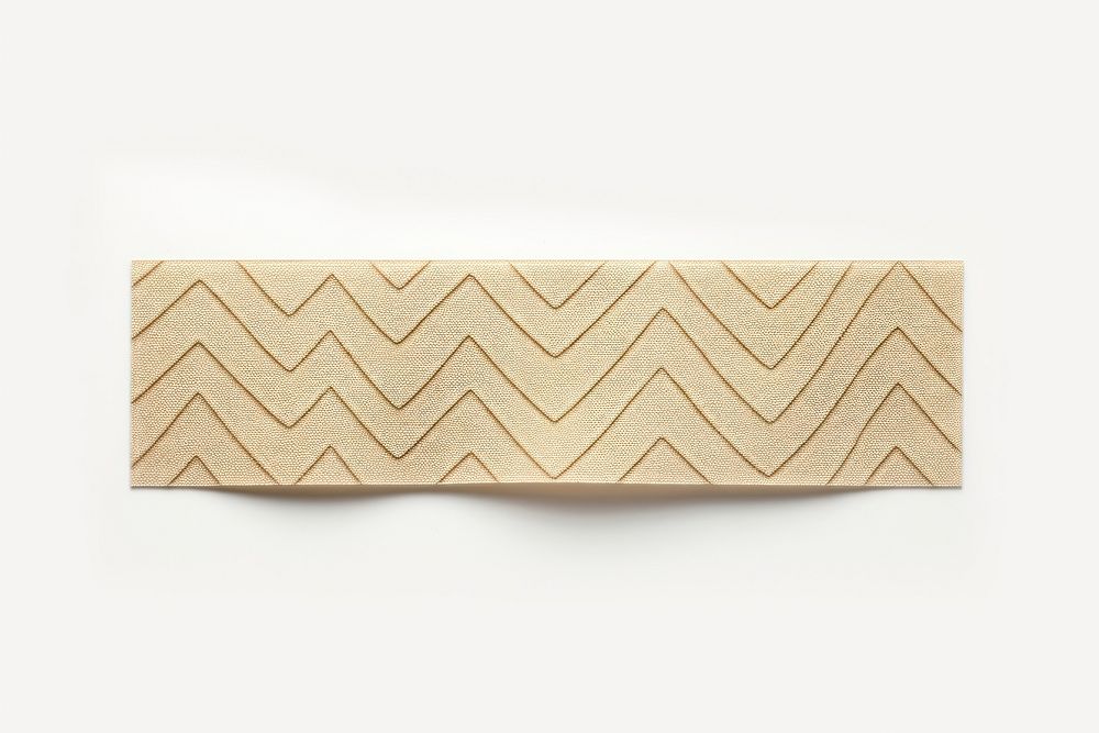 Chevron pattern adhesive strip plywood white background simplicity.