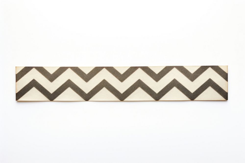 Chevron pattern adhesive strip white background rectangle shape.