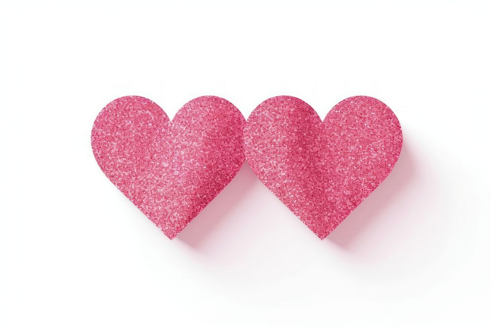 Heart pink glitter paper white background celebration accessories.