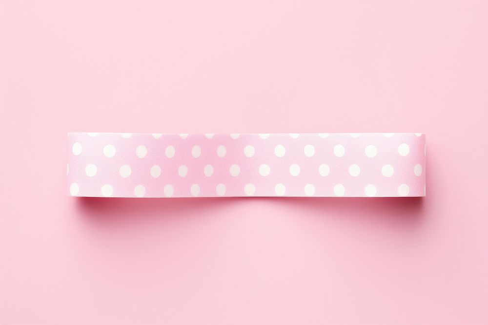 Pink dot pattern adhesive strip rectangle spotted circle.