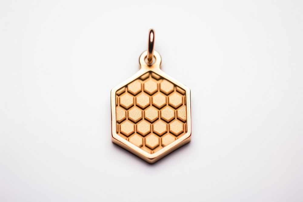 Gold honeycomb charm pendant jewelry locket.