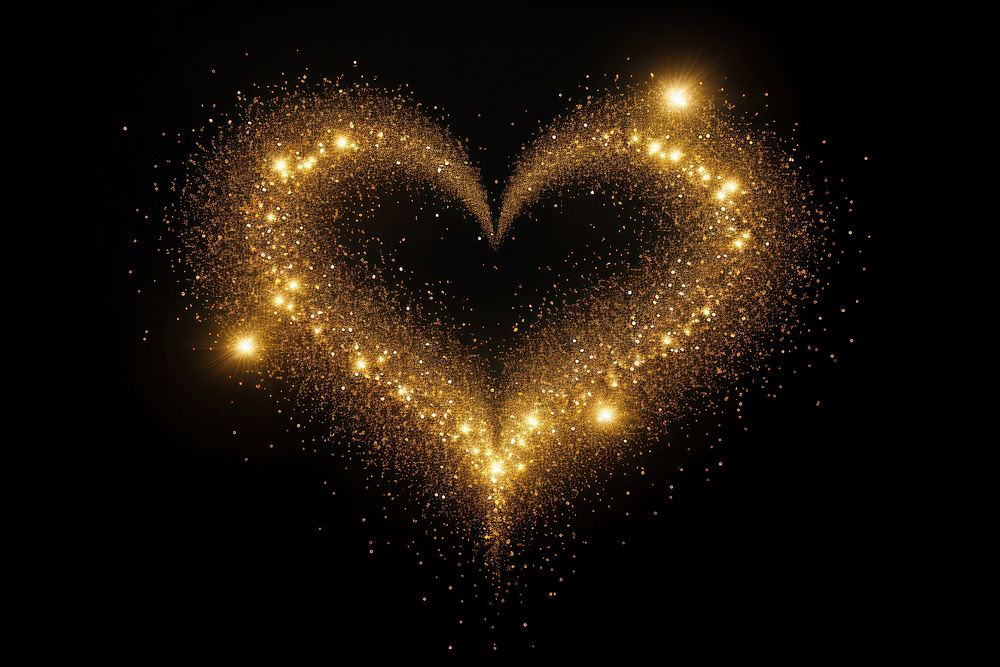 Heart sparkle light glitter night gold black background.