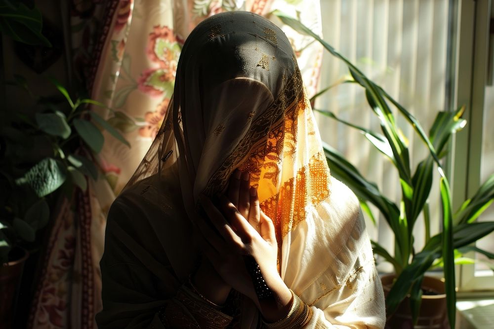 Muslim woman pray adult bride veil.