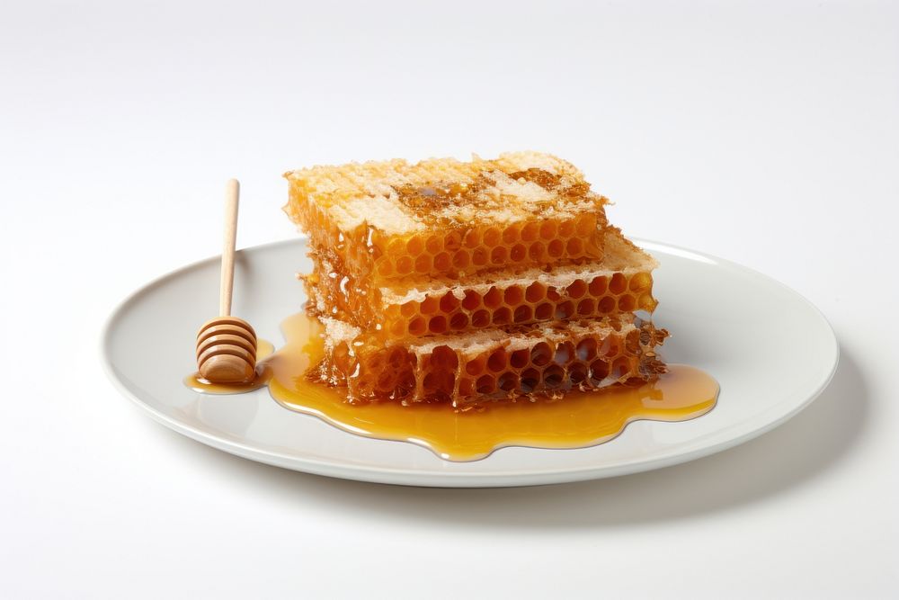 Honey comb on plate honeycomb food white background.