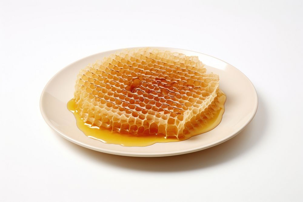 Honey comb on plate honeycomb food white background.