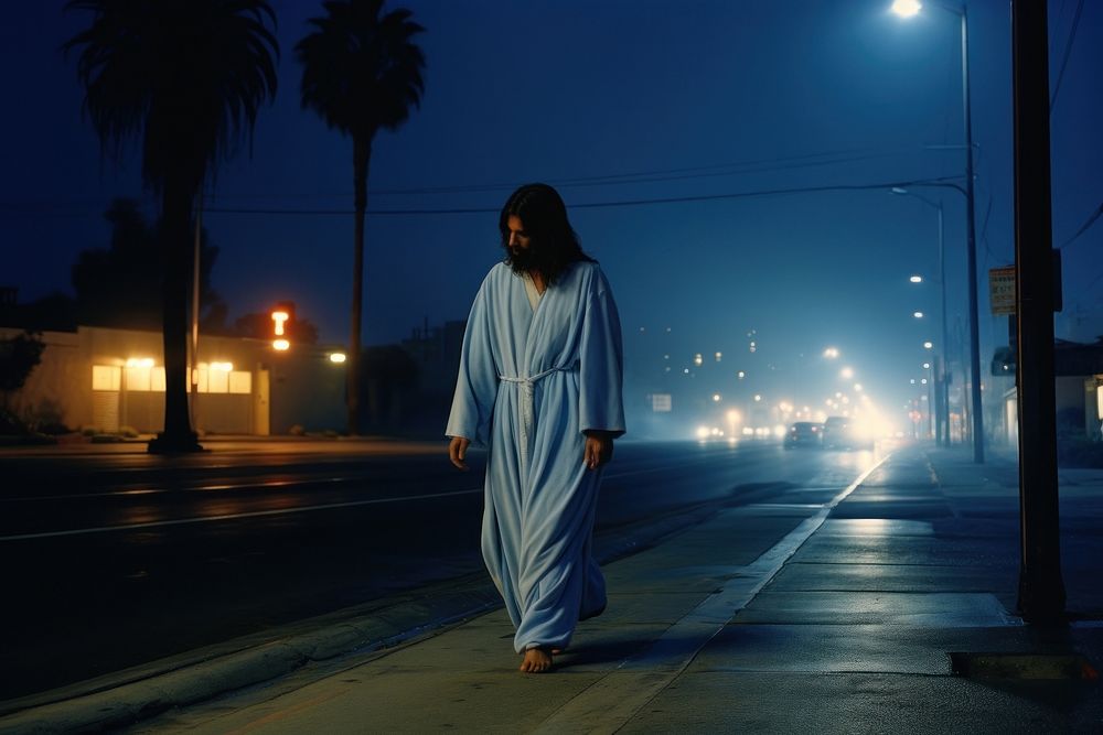 Jesus Chris walking in California street outdoors standing light.