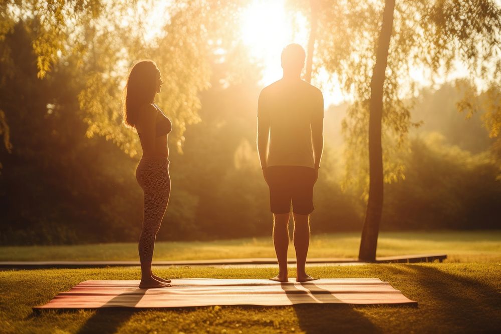 Yoga mat sunlight stretching outdoors.
