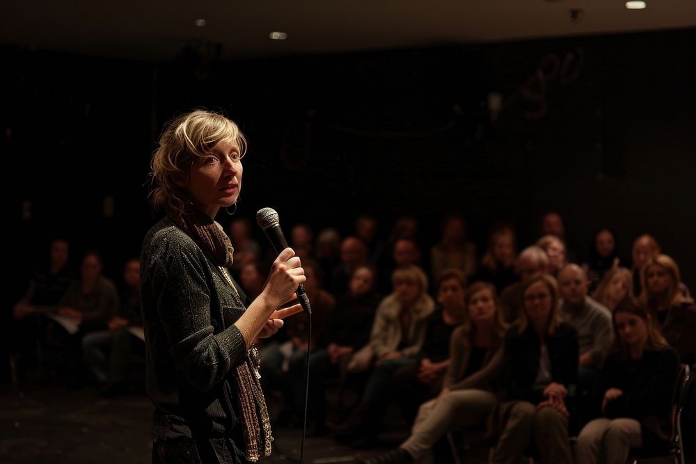 Speaking microphone audience adult.