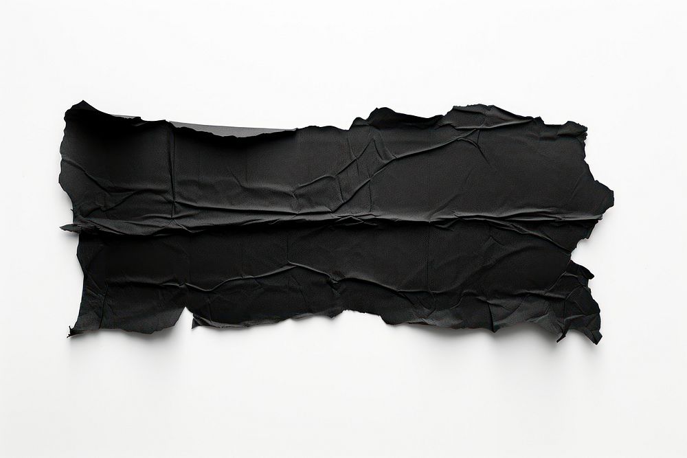Torn strip of black paper white background monochrome textured.