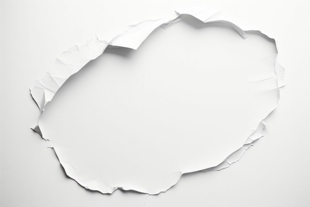 Torn strip of rounded paper white backgrounds white background.