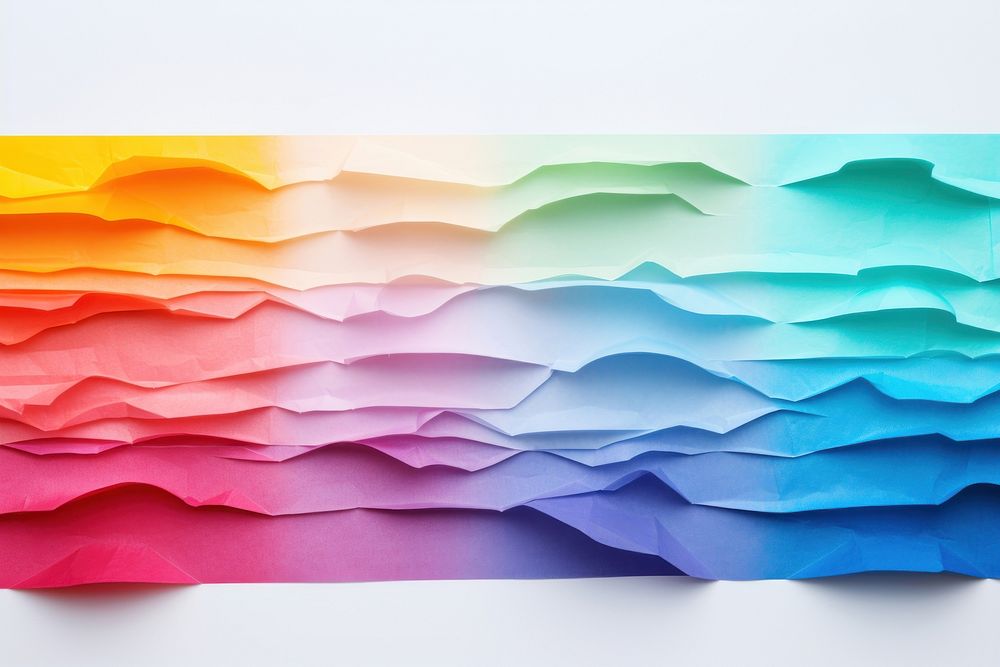 Torn strip of rainbow paper border backgrounds art creativity.
