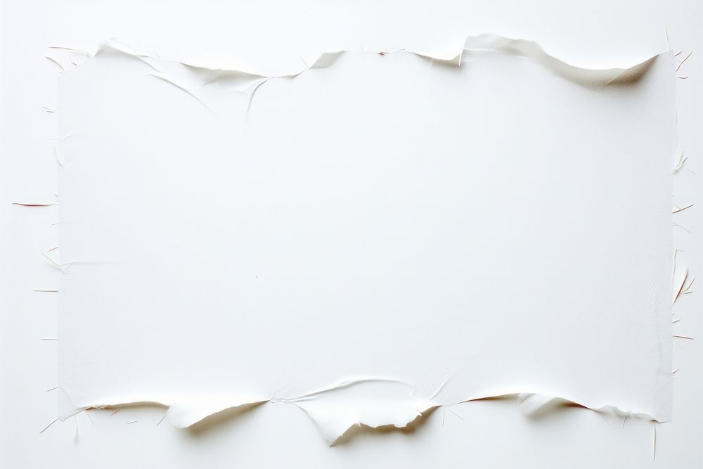 Torn strip of tape paper backgrounds white.