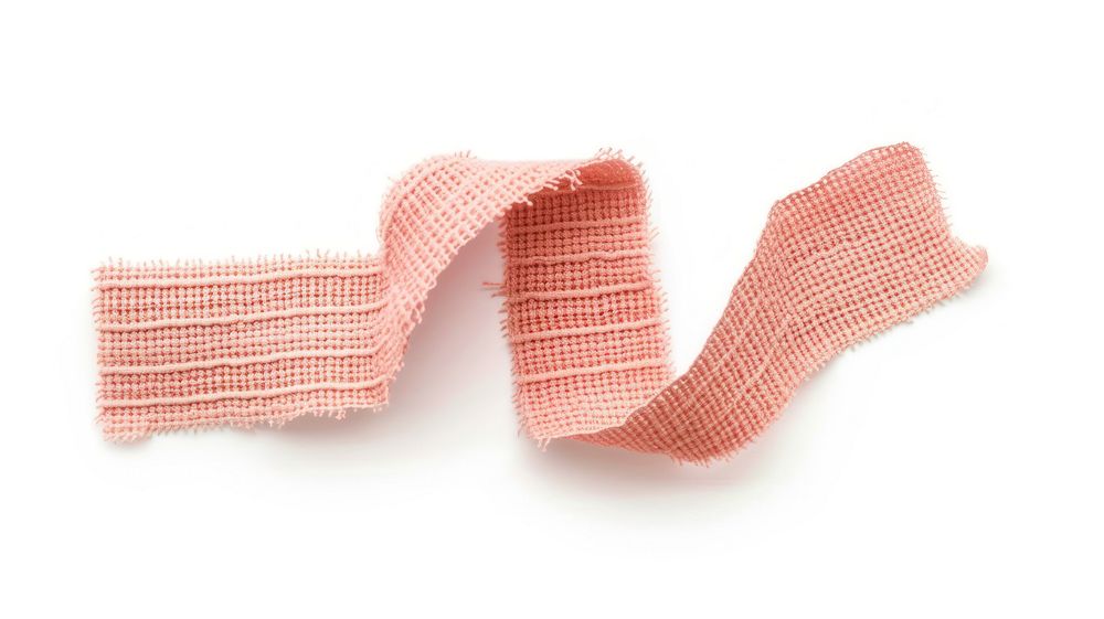 Rib knitted salmon pink color tape adhesive strip bandage white background accessories.