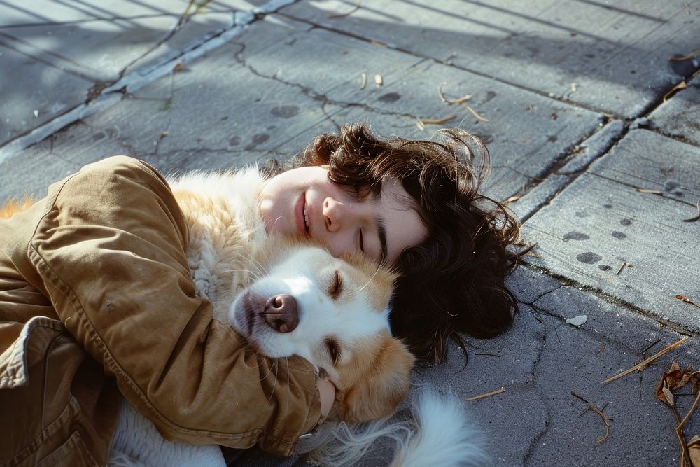 Person hugging a dog pet portrait mammal.
