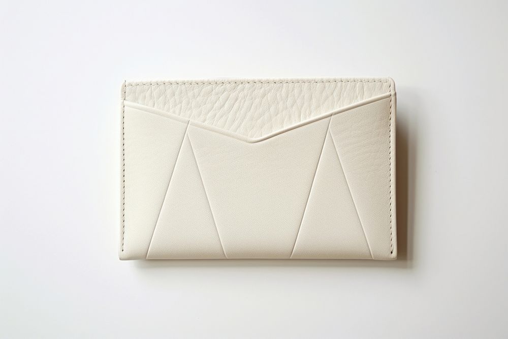 White leather card holder handbag white background accessories.