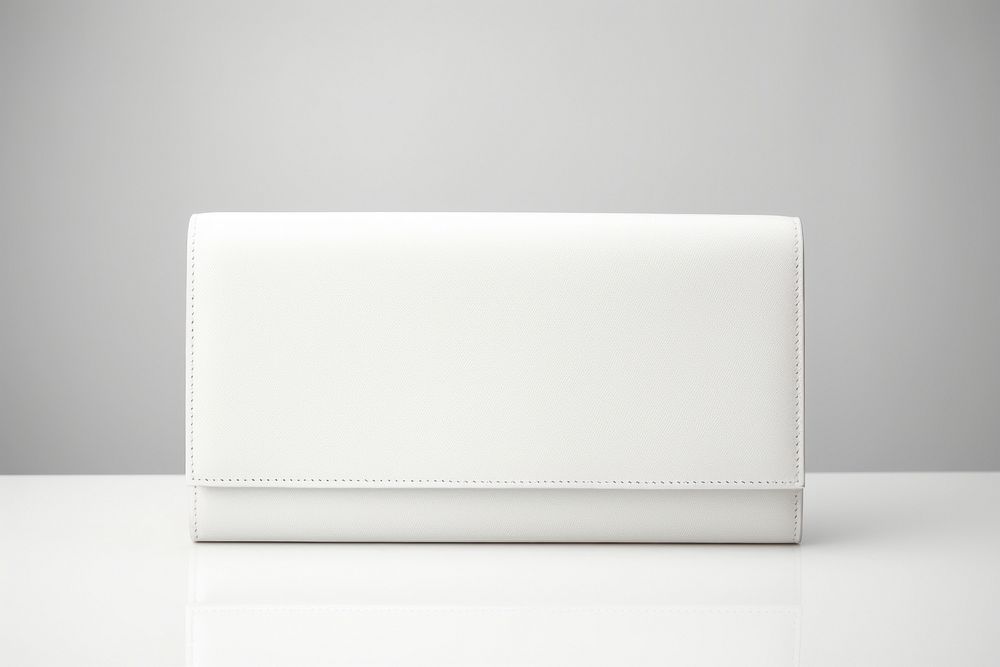 White leather continental wallett white background accessories electronics.