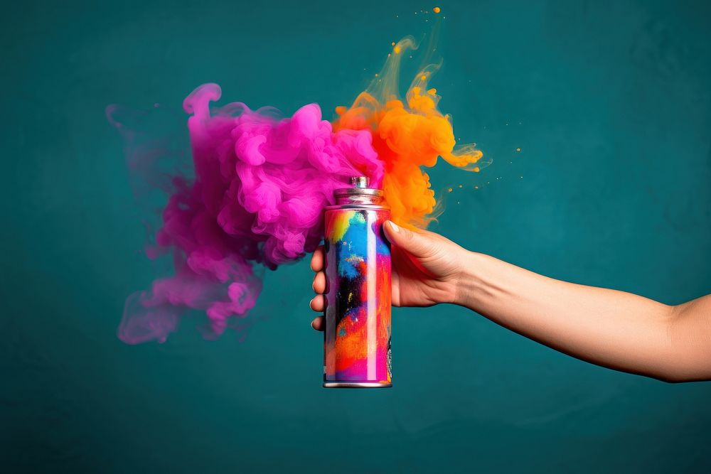 Hand using spray can creativity enjoyment throwing.