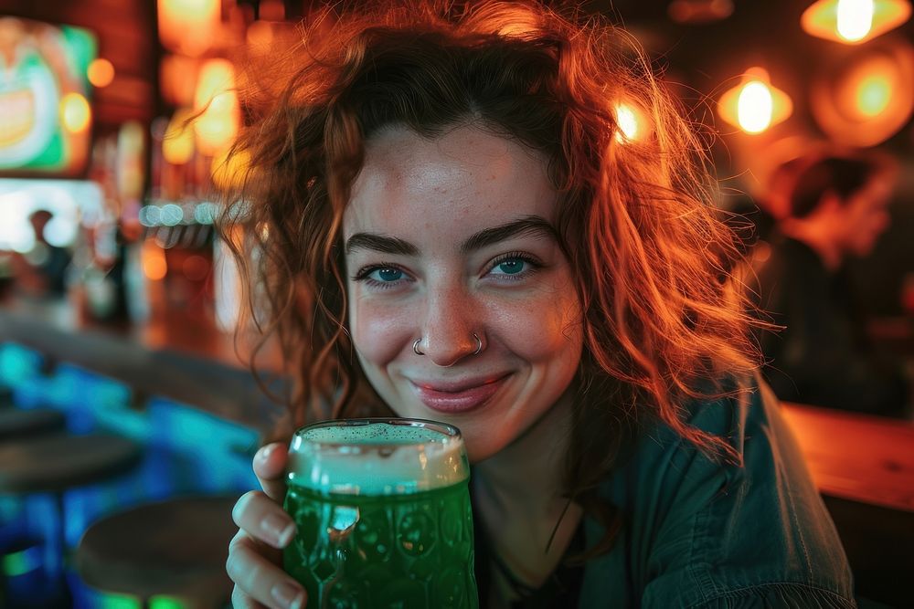 Irish woman drinking green beer portrait adult smile.