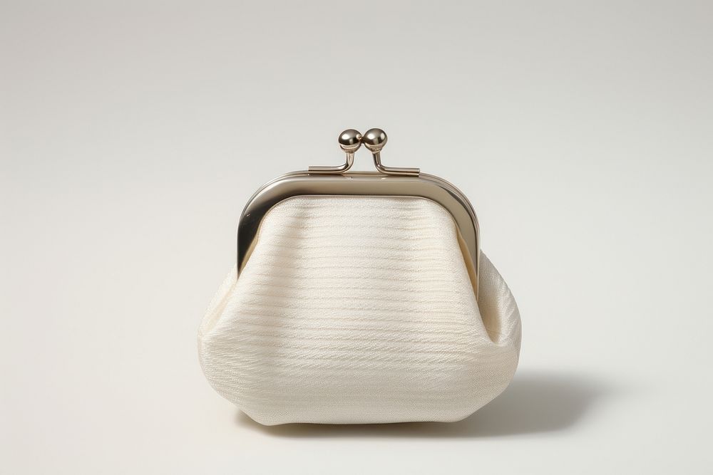 Nylon buckle coin purse with kiss-lock handbag white white background.