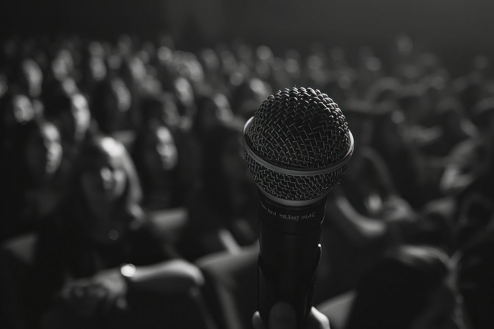 Speak microphone audience stage.