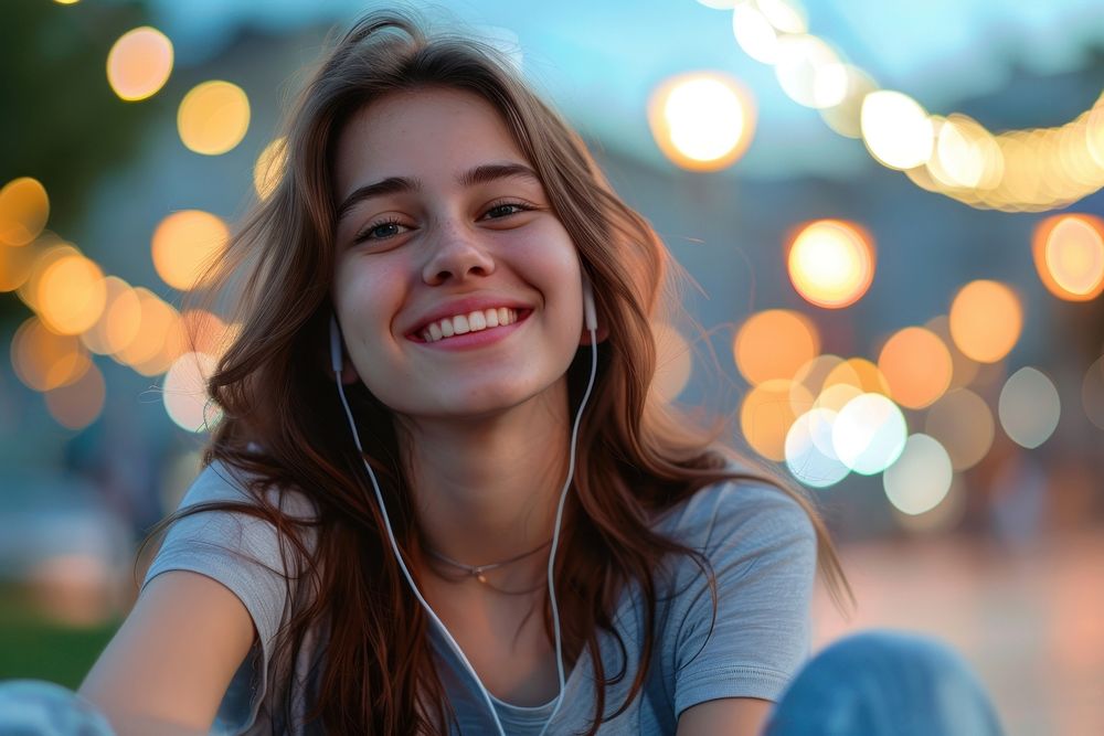 Young happy female photography listening portrait.